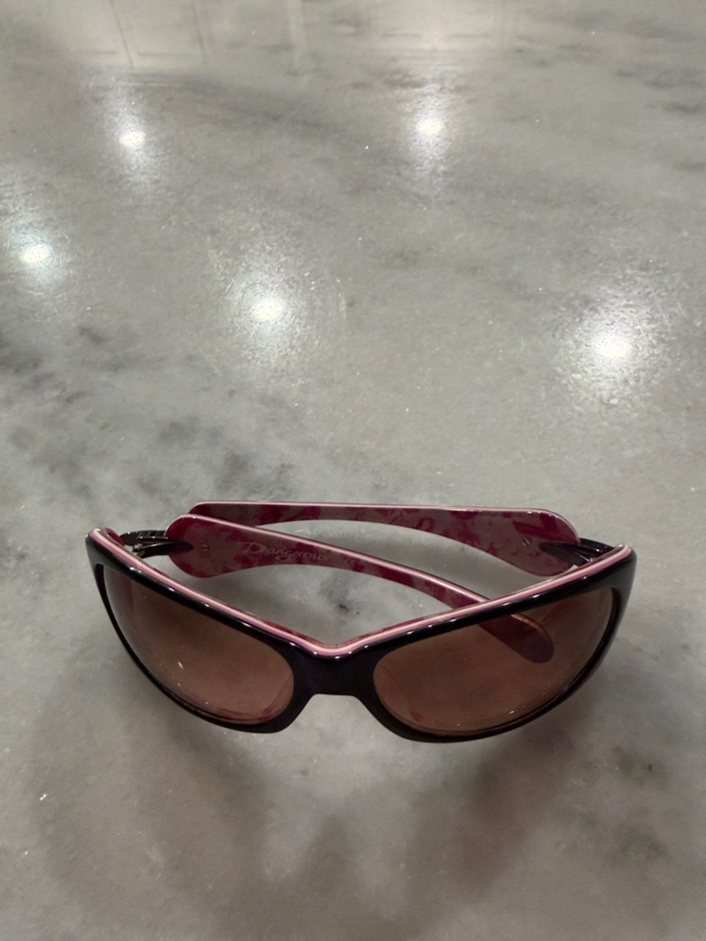 Oakley Women’s Pink and Black Frame Sunglasses with Brown Lenses